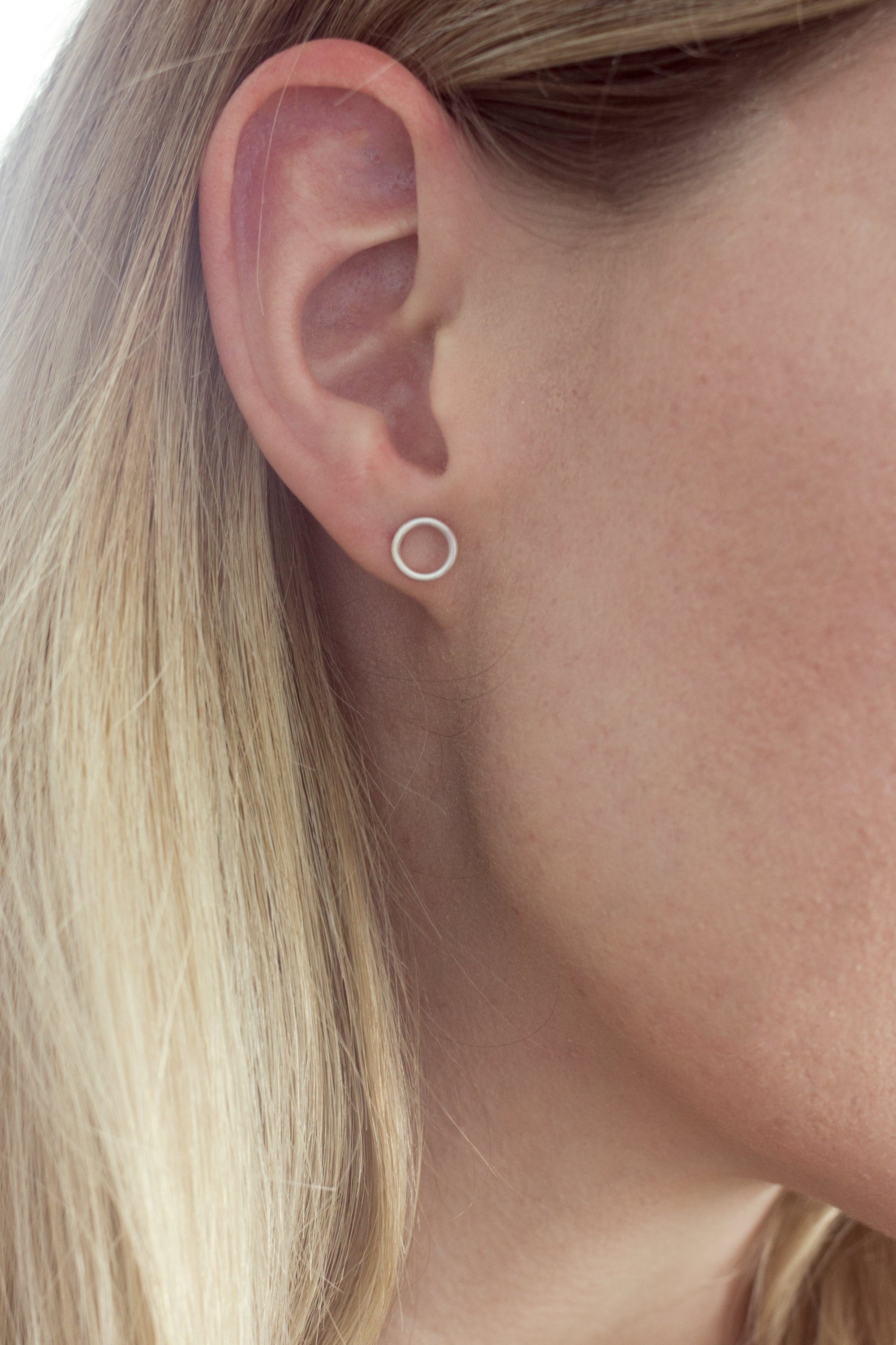 Sterling silver open circle stud earrings top
